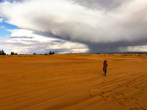 Walking on the desert plain near Erg Chebbi