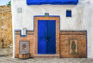 Painted door of an earthen ksar in southern Morocco