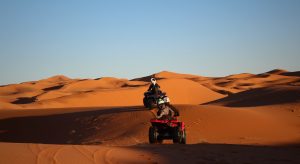 Quad bike on the dunes near Merzouga in the Moroccan Sahara