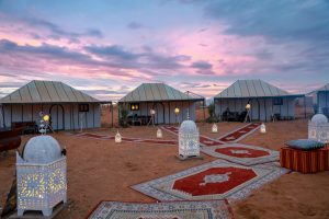 Desert camp tents at sunset in Erg Chebbi near Merzouga