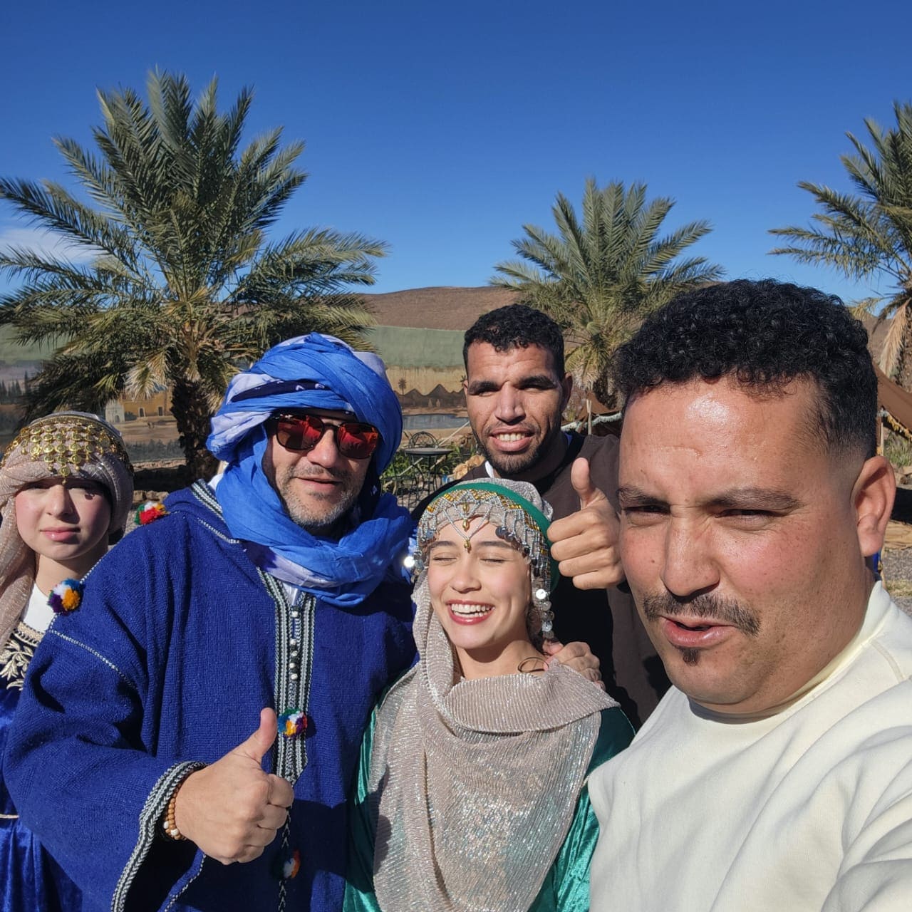 moroccan traditional clothing · traditional clothing in morocco · moroccan clothing · what do moroccans wear · djellaba · moroccan kaftan · takchita · jabador · selham · babouche · moroccan traditional dress · moroccan dress code
