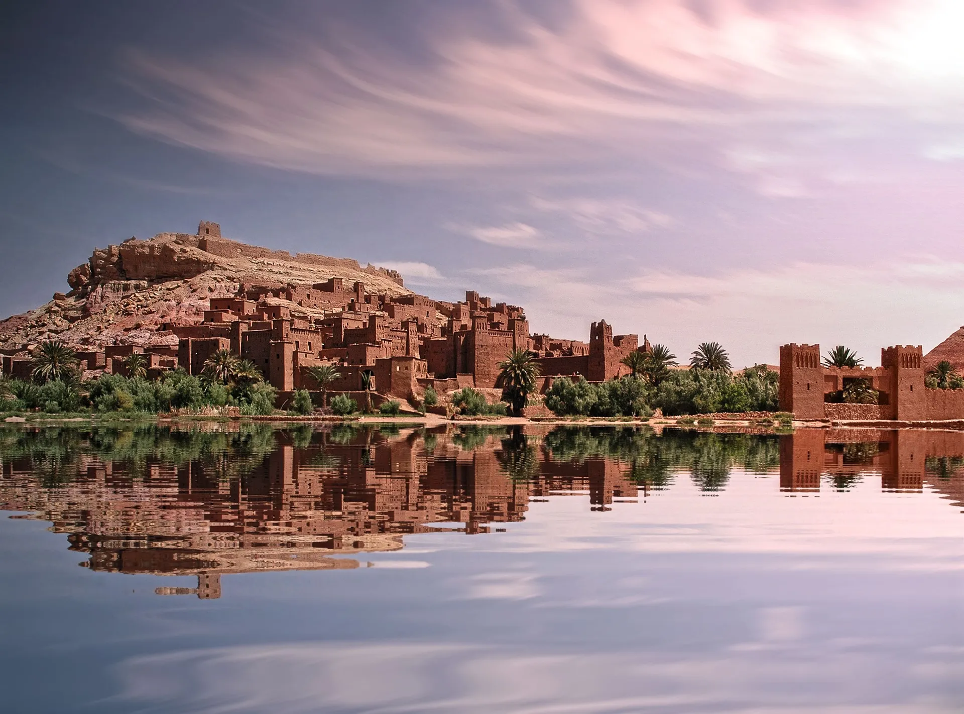 Ait Ben Haddou kasbah reflected in the river – private Morocco tours